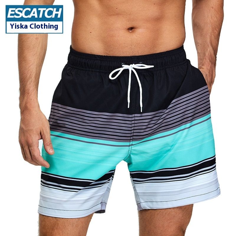 Nuovi pantaloncini da uomo a righe nere, grigie e verdi a quarti di lunghezza con tasche con cerniera e stampa casual elastica su quattro lati_voghion.com