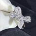 Anel de casamento feminino Zhenrong com laço, zircônia cúbica, elegante e luxuoso, com acabamento em diamante simulado._voghion.com