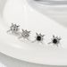 Black And White Titanium Steel Eight Pointed Star Earrings Inlaid With Zircon Star Design High Street Style Earrings For Men And Women_voghion.com