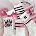 Unisex Socks female long tube ins tide high appearance level Sen department middle tube student white word mother and daughter grow socks female_voghion.com