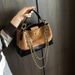 Borsa a tracolla versatile con tracolla a secchiello, nuova moda 2025, stile di alta qualità, con catena trapuntata per donna_voghion.com