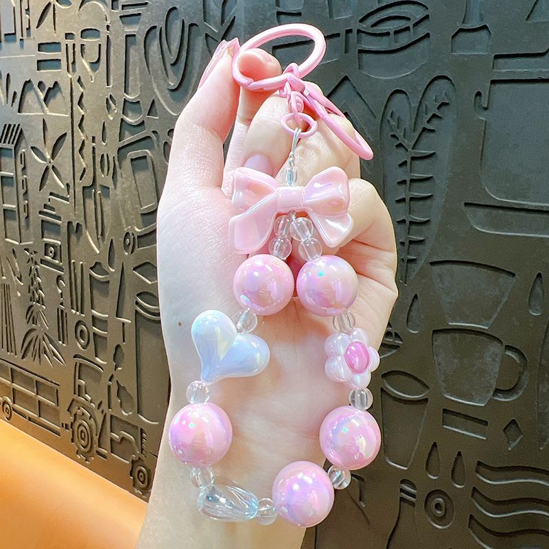Portachiavi con ciondolo a forma di cuore con fiocco di perline placcato color caramella, creativo e fresco_voghion.com