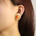 New light luxury retro irregular round earrings for women, inlaid with cat eye stones, high-end and exaggerated design, stainless steel earrings_voghion.com