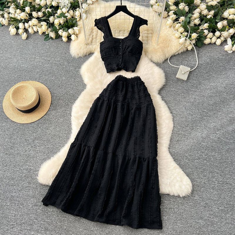 Vêtements pour femmes, ensemble tricoté, haut à bretelles creuses au crochet, jupe fendue taille haute, ensemble tricoté deux pièces_voghion.com
