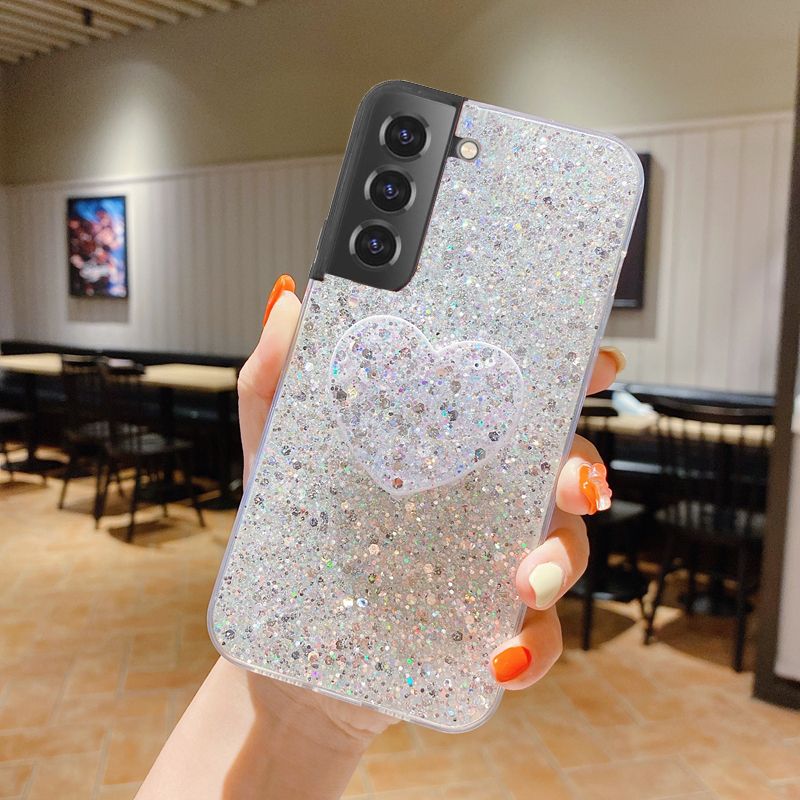 Cassa del supporto del telefono di amore del cuore di scintillio lucido per Samsung Galaxy S22 S21 S20 Ultra Plus FE lamina d'argento oro morbido silicone C_voghion.com