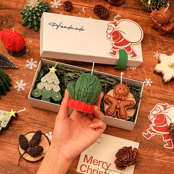 Vela aromática navideña artesanal con forma de árbol de Navidad y ciervo, en caja de regalo._voghion.com