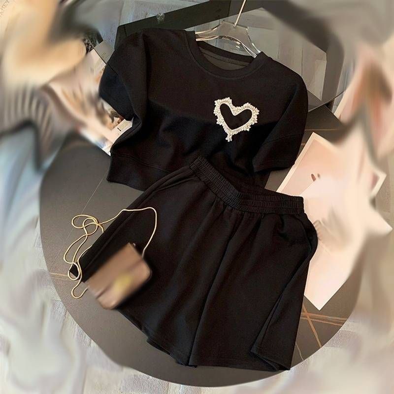 Damenbekleidung High-End-Mode Altersreduzierender modischer kurzärmliger Shorts-Zweiteiler_voghion.com