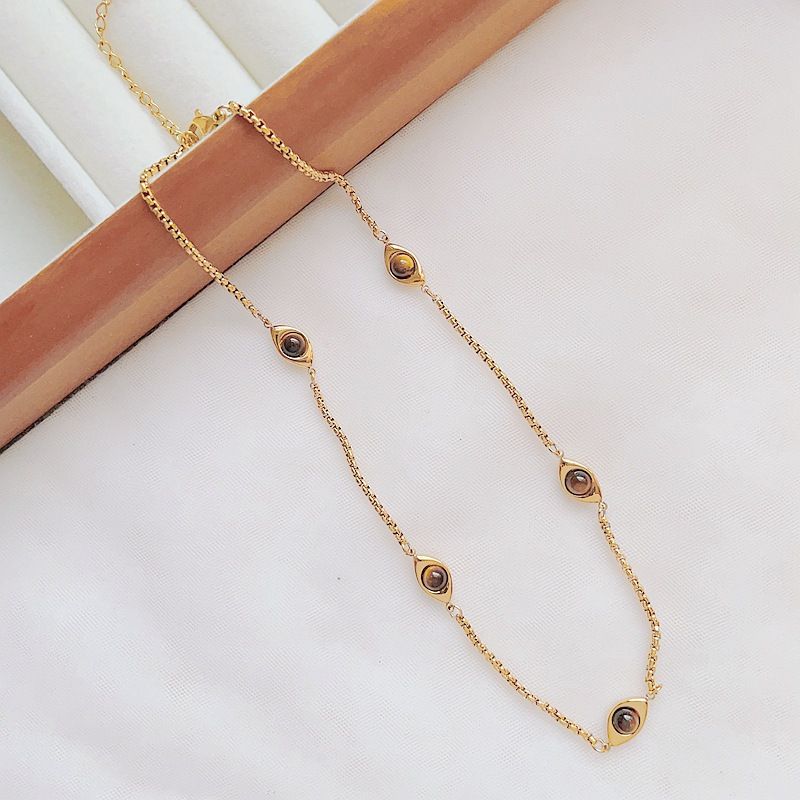 Collana in acciaio al titanio con occhio di tigre geometrico in stile semplice ed elegante all'ingrosso_voghion.com