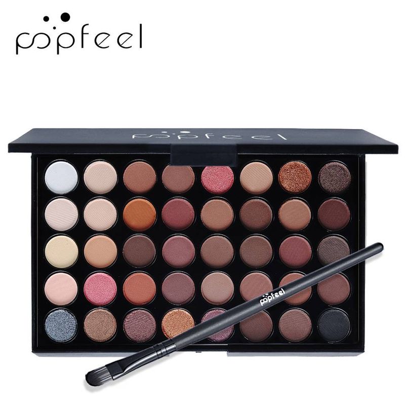 Set di trucco da 40 ombretti colorati con pennelli per ombretti. Studi fotografici alla moda e popolari. Passa alle nuove palette di ombretti._voghion.com