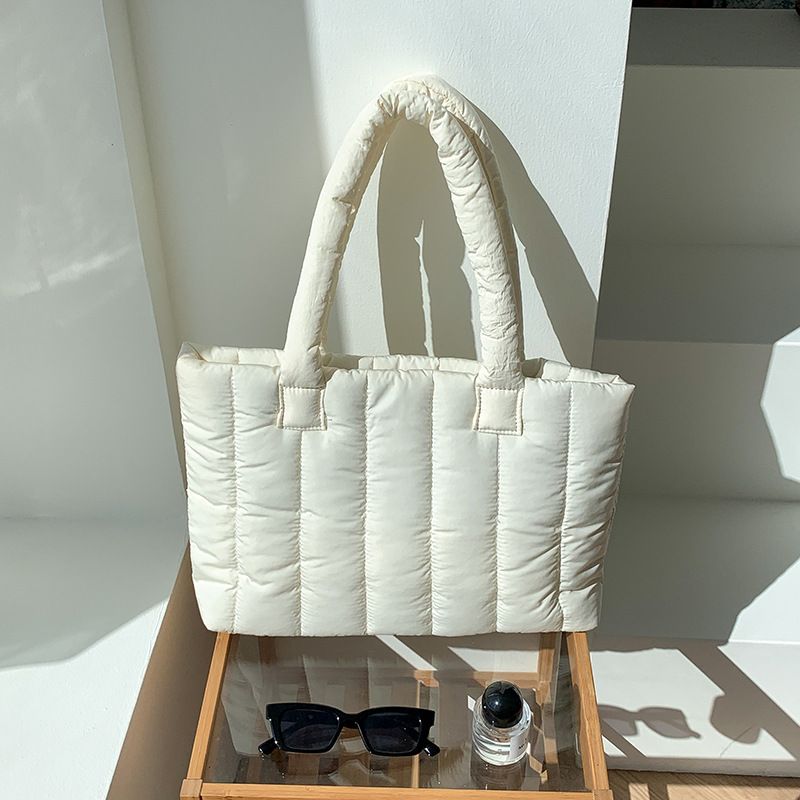 Down Bag Women's 2023 Autunno e inverno New Casual Women's Bag Niche borsa tote monospalla imbottita in cotone a righe di grande capacità_voghion.com