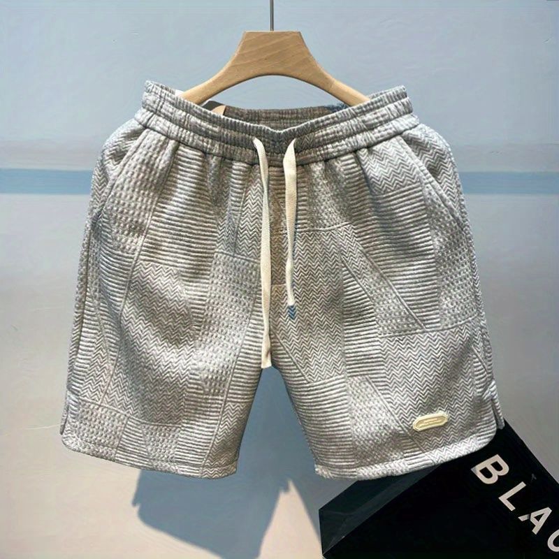 Herreklær bølgete shorts, designer nisje avslappet fempunkts strandbukser, sommer high street sportsshorts_voghion.com