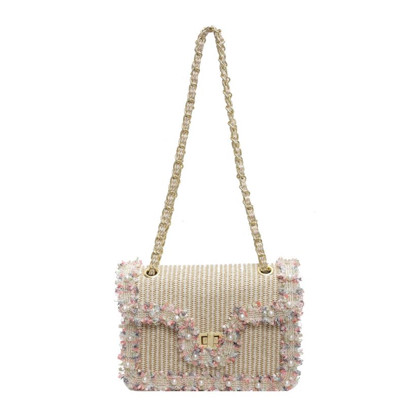 Korean version of Xiaoxiangfeng chain 2024 summer new women's stylish lace shoulder bag, personalized grass woven_voghion.com