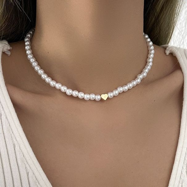 Collana girocollo con elegante perla e ciondolo a forma di cuore cavo, semplice e multistrato, per donna._voghion.com
