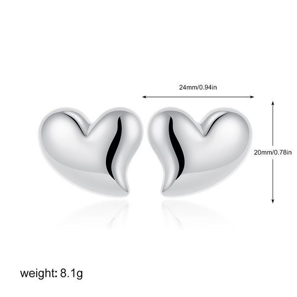 Orecchini unisex di alta moda, di nicchia, versatili, con cuore in oro e argento lucido._voghion.com