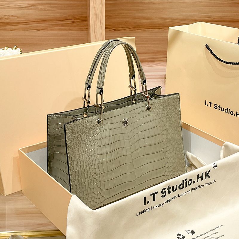 Hong Kong genuine leather handbag for women, casual tote women's large capacity commuting crossbody bag, 2024 new bag_voghion.com