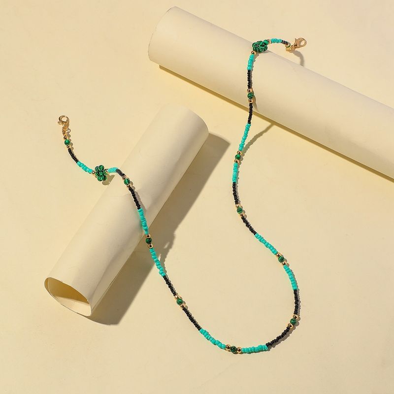 Collana con maschera floreale in resina con perline turchesi, stile semplice e alla moda, per donne_voghion.com