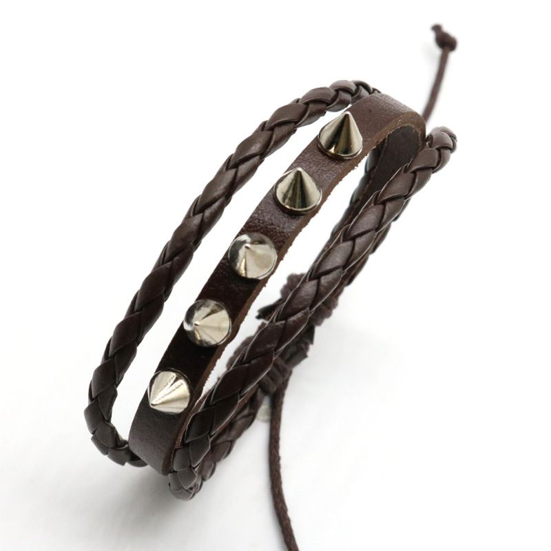 Braccialetto unisex alla moda, in pelle intrecciata, con borchie, stile rock non mainstream, punk alla moda_voghion.com