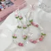Grazioso ciondolo a forma di ciondolo per cellulare con perline color pesca, gioielli per ragazze e donne, cordino a forma di fiore di perle per portachiavi per iPhone_voghion.com