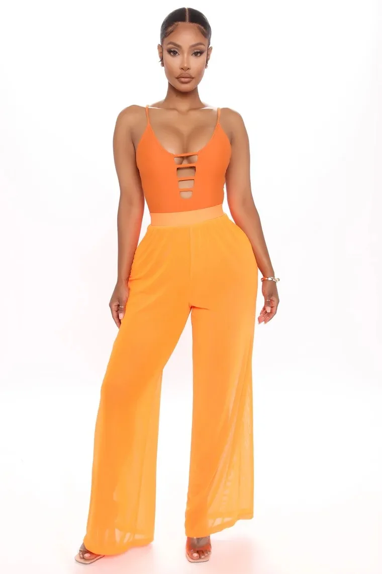 Sieviešu seksīgas, caurspīdīgas, platas bikses no tīras krāsas sieta auduma._voghion.com