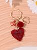 Portachiavi con ciondolo a forma di cuore con fiocco e pompon, grazioso ciondolo per borsa_voghion.com