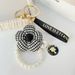 Portachiavi per auto con ciondolo a forma di testa di fiore con perla e nappa, grazioso accessorio con strass, decorazione per borsa_voghion.com