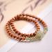 Tianyu running ring Wenwan Laoshan sandalwood double circle bracelet hand twisted rosary Buddhist beads female_voghion.com
