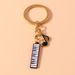 2025 New Fashion Music Style Notes Piano Keychain Accessories Backpack Cell Phone Pendant Car Charms_voghion.com