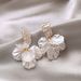 Flower Shell For Women 2025 New Light Luxury High-end Sense Stud Elegant Drop Niche Design Pearl Earrings_voghion.com