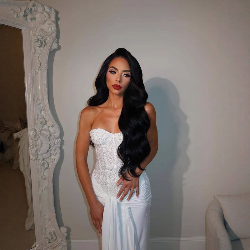 ​​"Statement Strapless Gown – Intricate Lace & Draped Corset For Spring Soirées"​​_voghion.com