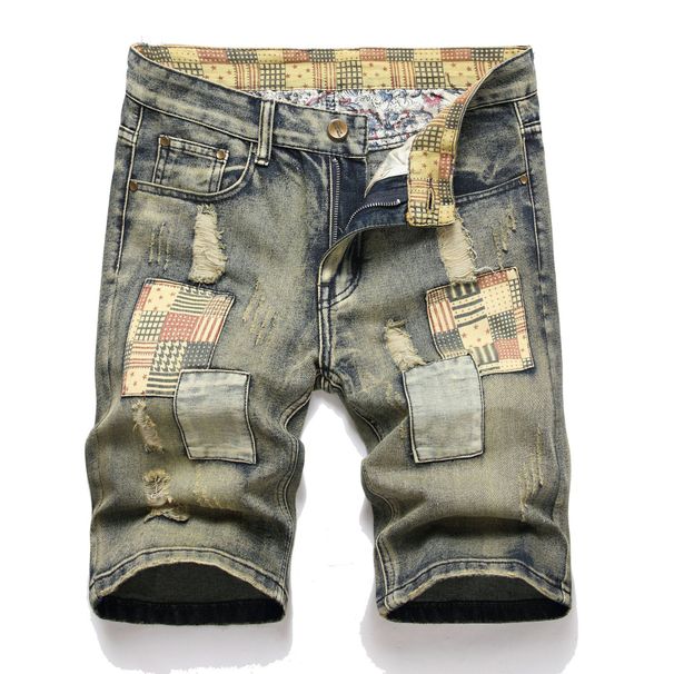 Jeans retrò con toppe strappate da uomo_voghion.com