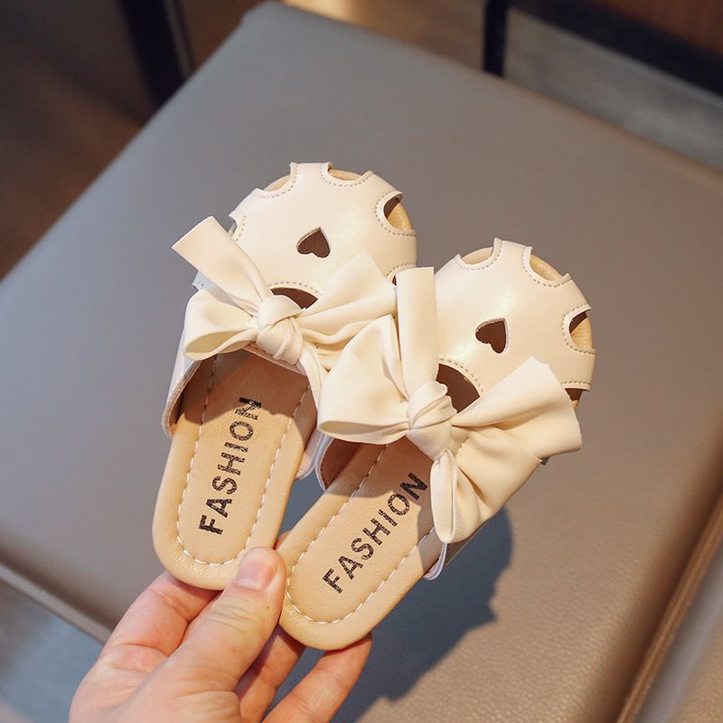Chinelos infantis verão novo laço oco flip-flops versão coreana de estrangeiros antiderrapante sola macia moda meninas_voghion.com