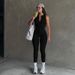 2025 Solid Color Half Neck Zipper Sleeveless Hollow Back Knitted High Elastic Casual Sports Jumpsuit_voghion.com