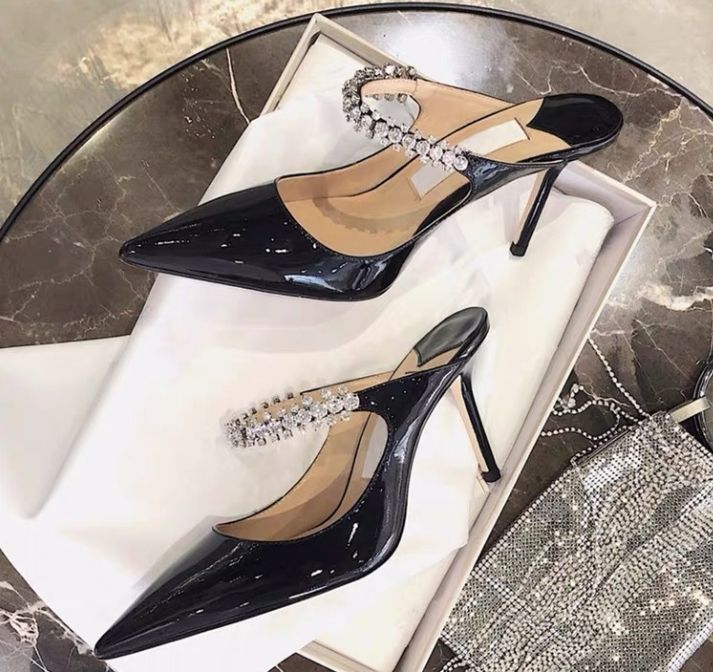 2024 Sommer Neue hochhackige feine Absätze Spitze Dia Hausschuhe tragen Linie mit einem Duttkopf Halb Drag Mueller Schuhe Frauen_voghion.com