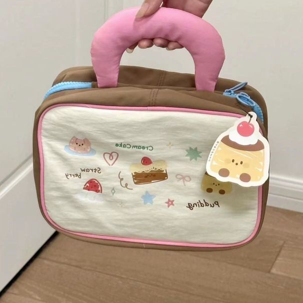 2025 neue Süße Dopamin Mädchen Kuchen Tragbare Große Kapazität Make-Up Reisetasche Mode Hundert Freizeit Täglich_voghion.com