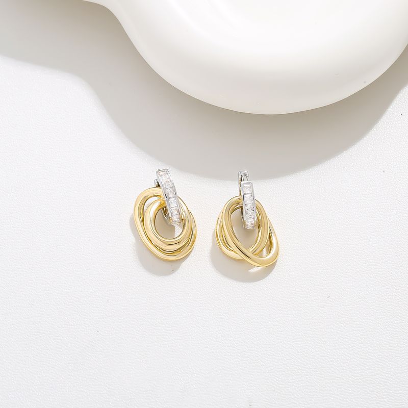 Boucles d'oreilles en métal zircon pour femme, bijoux simples et capricieux, boucles d'oreilles polyvalentes à la mode, boucles d'oreilles de niche, boucles d'oreilles d'été légères et luxueuses_voghion.com