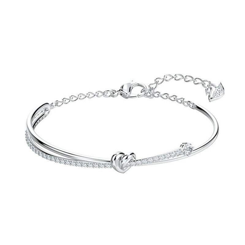 Braccialetto con nodo d'amore Braccialetto con nodo a forma di cuore in cristallo con elemento femminile_voghion.com