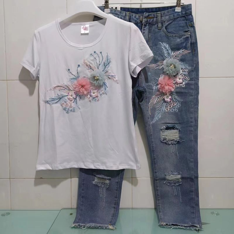 Abbigliamento femminile popolare abito alla moda femminile estate maglietta con fiori tridimensionali ricamati + jeans strappati a nove punte_voghion.com