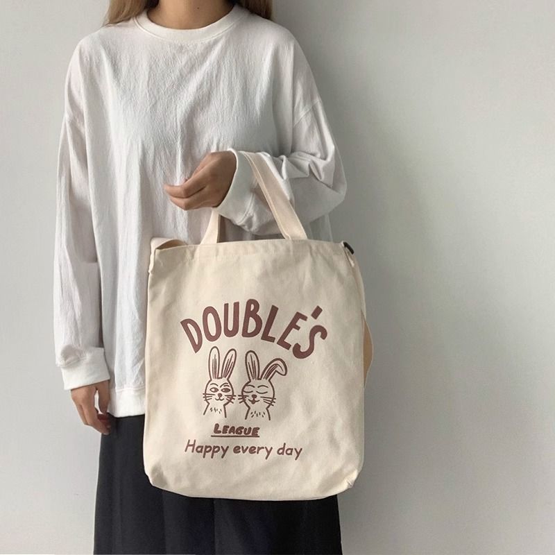 Borsa a tracolla da donna con motivo a cartoni animati, borsa da scuola per studenti di grande capacità, nuova borsa tote in tela portatile 2023_voghion.com