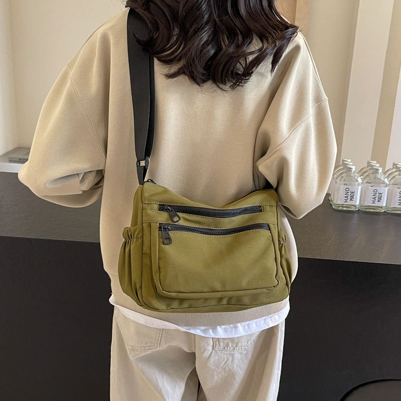 Bolsa transversal feminina com vários bolsos, nova moda primavera 2025, versátil, multicamadas, de ombro único, para passeios, viagens e deslocamentos_voghion.com