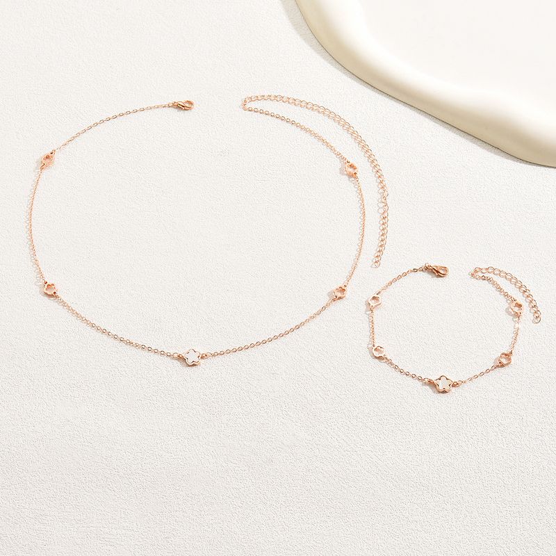 Bracciale con design a fiore di prugna, collana lunga in oro rosa, set di gioielli di nicchia versione coreana_voghion.com