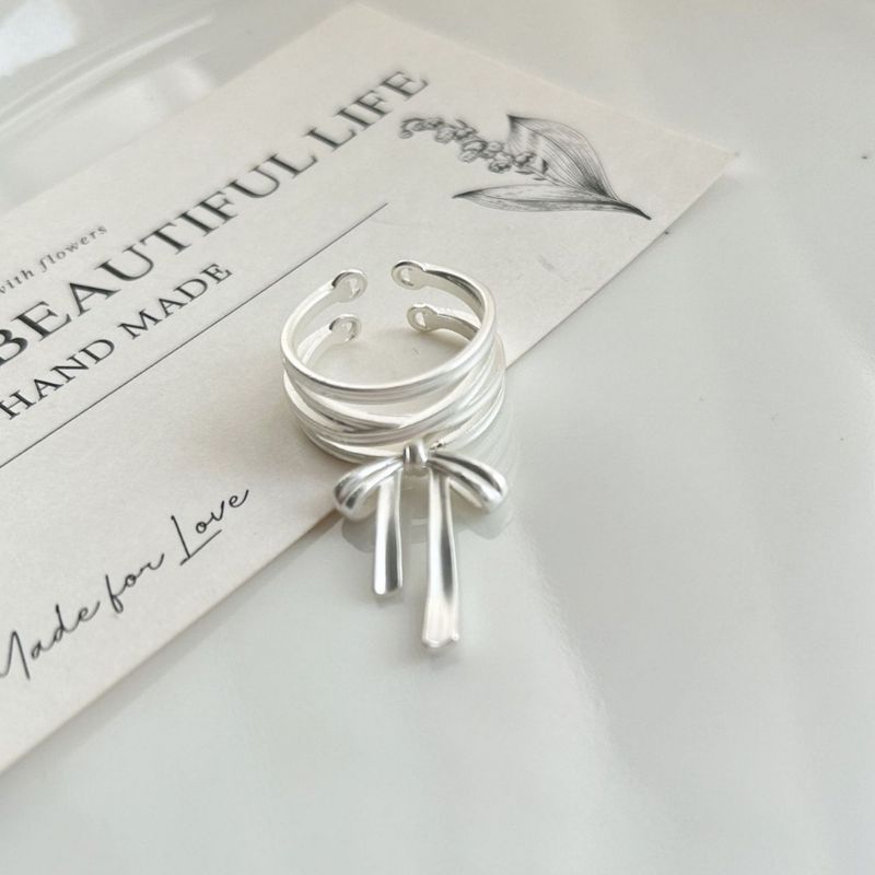 Anello aperto con fiocco in stile balletto, design di nicchia femminile, anello regolabile per dito indice, anello unico per celebrità di Internet femminile_voghion.com