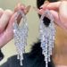 Copper alloy diamond-set waterfall earrings, silver temperament drooping geometric tassel light luxury thin earrings_voghion.com