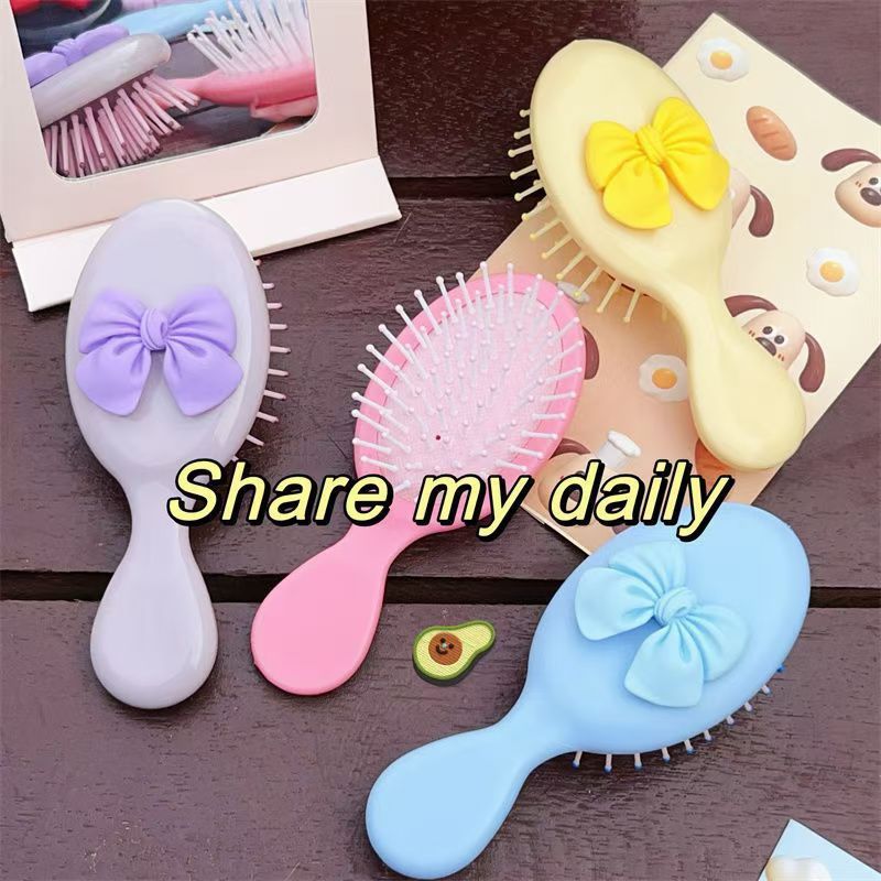Bowknot Massage Air Bag Comb with Mini Makeup Mirror_voghion.com