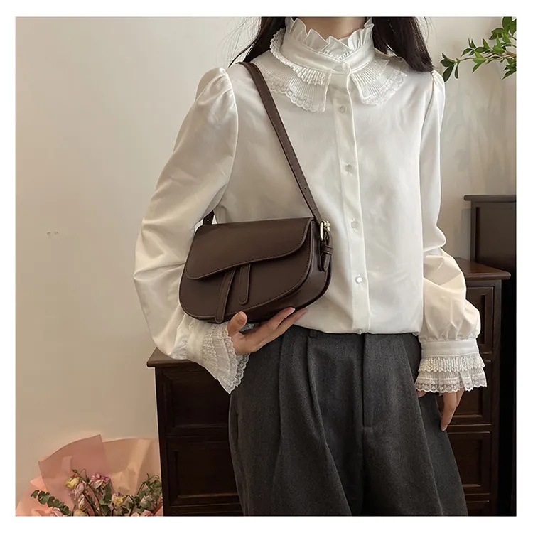 Paquet de niche de texture premium pour femmes, nouveau sac pour femme, sac à bandoulière populaire d'été, sac de selle à bandoulière simple_voghion.com