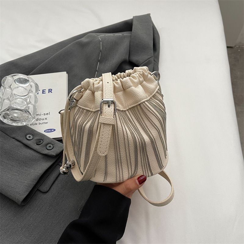 Fashion Tassel Drawstring Bucket Shoulder Bag Women 2023 Summer New Daily versatile commuting texture Messenger bag_voghion.com