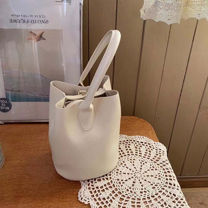 Bolsa de ombro pequena para mulheres, nova moda coreana, simples, casual, bolsa balde com grande capacidade_voghion.com