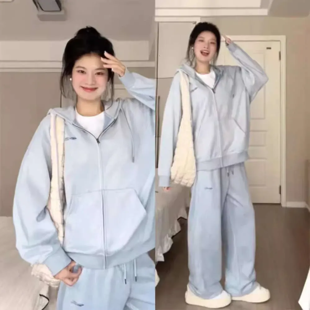 Ensemble deux pièces de sport bleu pour femme, sweat-shirt à capuche ample, idéal pour le début de l'automne et la mode décontractée._voghion.com