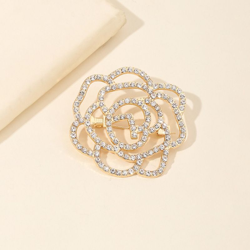 Diamond studded hollow small fragrant camellia corsage high end luxury with pin accessories exquisite anti exposure_voghion.com