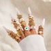 Set di anelli placcati in oro con malocchio e simbolo celeste per donna, 12 anelli impilabili boho con pietre preziose e perle, collezione di gioielli spirituali alla moda_voghion.com
