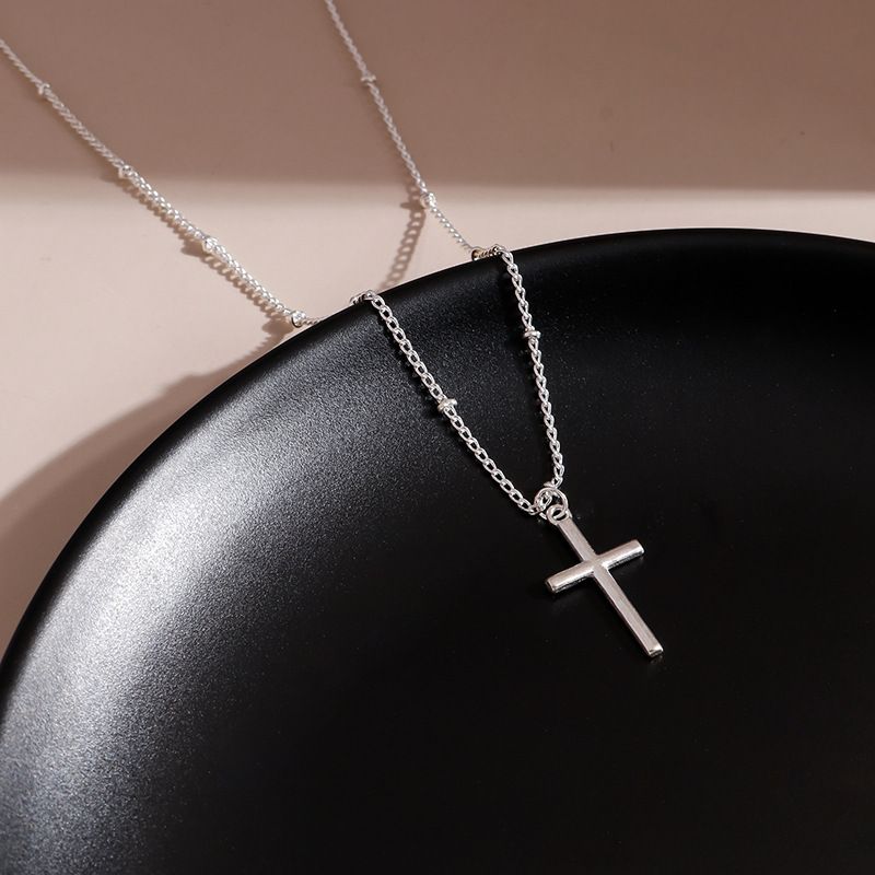 Collana con croce da donna, collana con croce semplice, velocità e passione_voghion.com